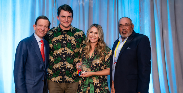 Steve Grossman, CEO of ICIC with Ron Homer, Chairman of ICIC’s Board, presenting Amy and Leo Voloshin, co-founders of Printfresh, the 2023 IC100 Business Growth Award at the ICIC Annual Conference.