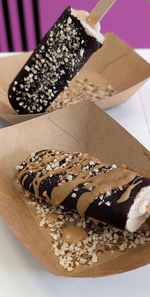 Photo of two Sorbae popsicles covered with chocolate.